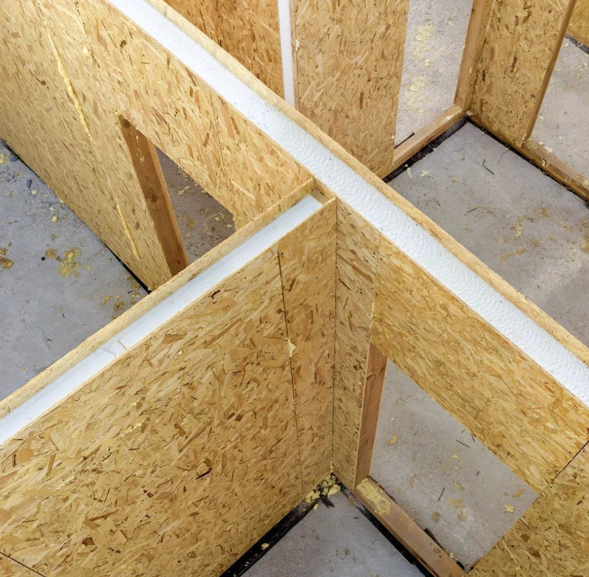 Exposed structural insulated panels showing wall intersections and openings